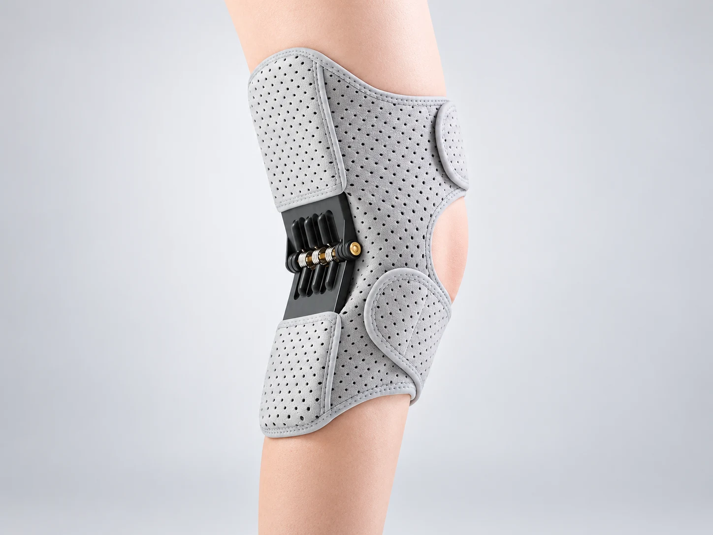 Wraparound knee brace with side hinges and adjustable straps