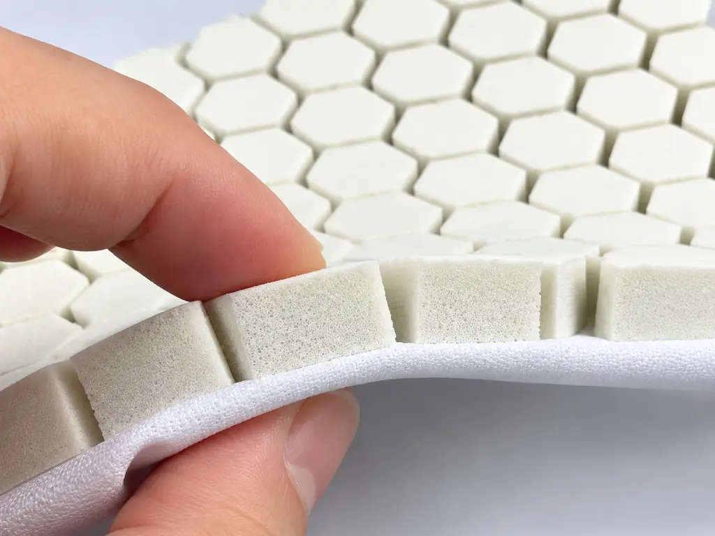 Custom-shaped padding components for elbow sleeves
